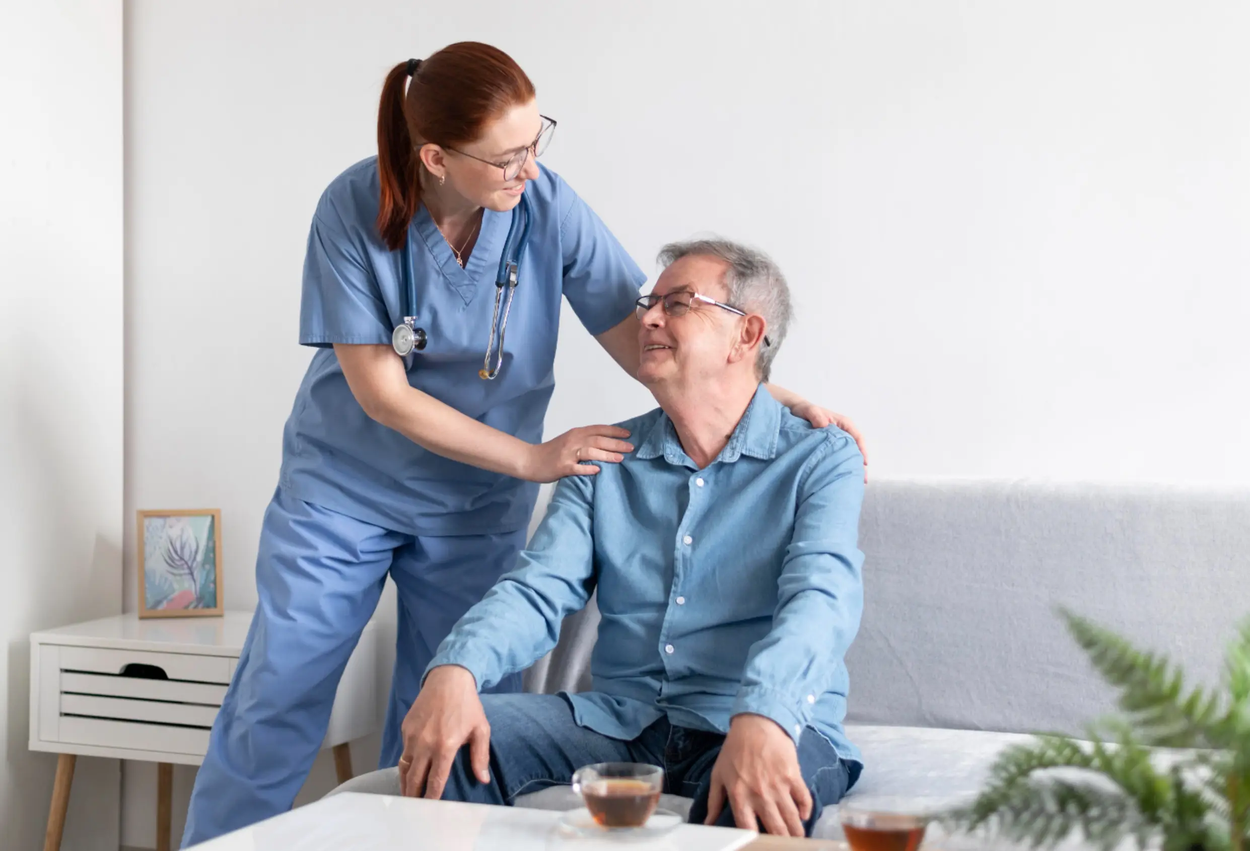 Medium shot smiley nurse and man Medium shot smiley nurse and man